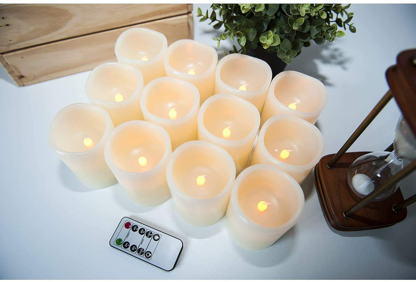 Lot de 12 bougies sans flamme Hausware à piles (D : 3 po x H : 4 po) Bougies piliers en cire véritable vacillantes Bougies LED sans flamme avec télécommande et minuterie (couleur ivoire)