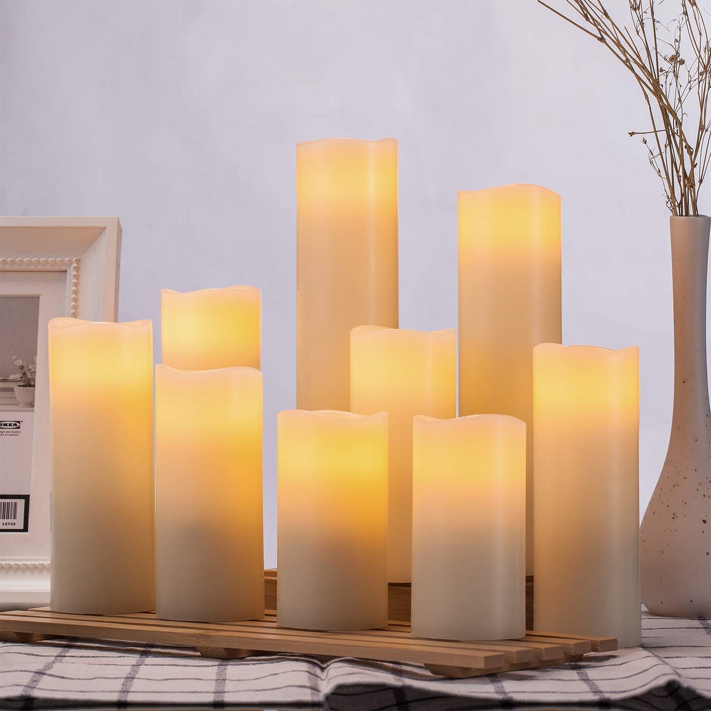 Lot de 12 bougies sans flamme Hausware à piles (D : 3 po x H : 4 po) Bougies piliers en cire véritable vacillantes Bougies LED sans flamme avec télécommande et minuterie (couleur ivoire)