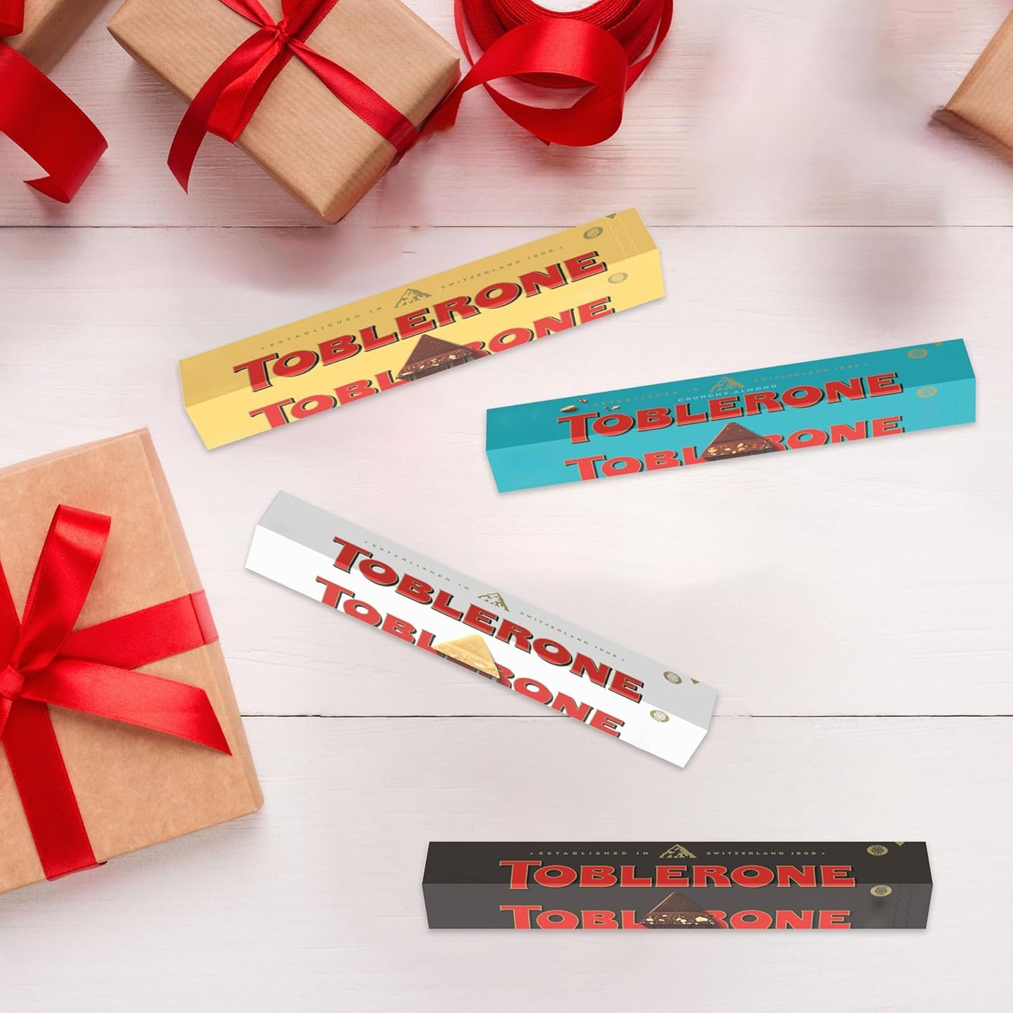 Toblerone Chocolate Variety Pack (Milk Chocolate, Dark Chocolate, White Chocolate, & Milk Chocolate with Salted Caramelized Almonds), Easter Chocolate, 12 - 3.52 oz Bars